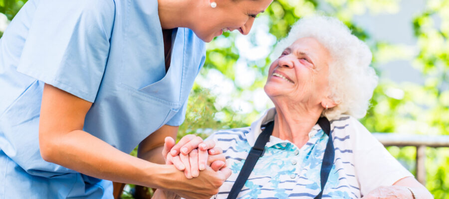Caregiver with elder patient.